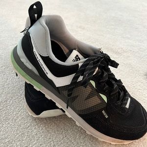 New Balance 574 black with green trim